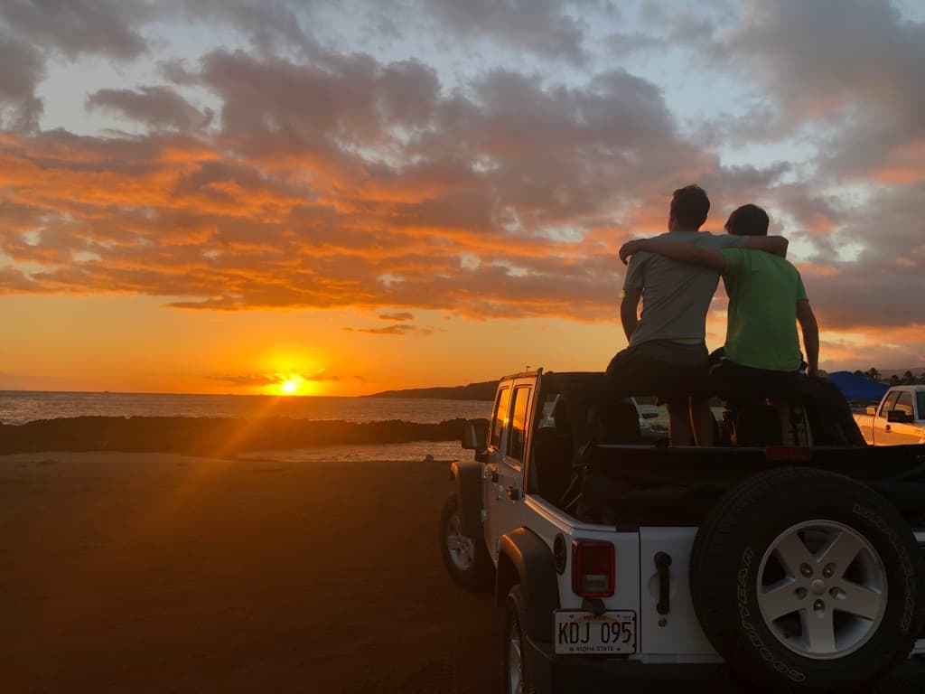 Watching sunset from a jeep