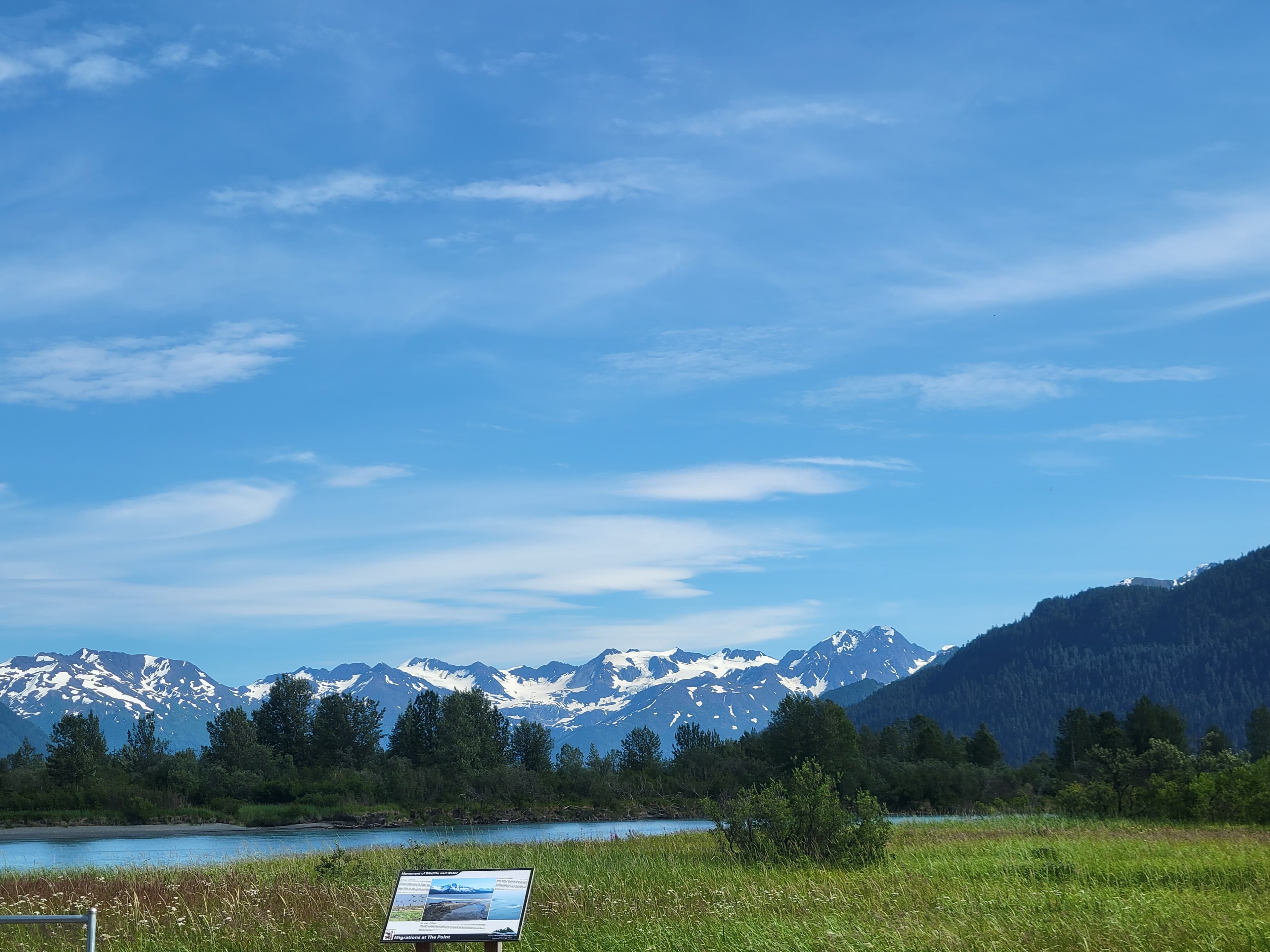 Beautiful view of snow-capped mountains and lake