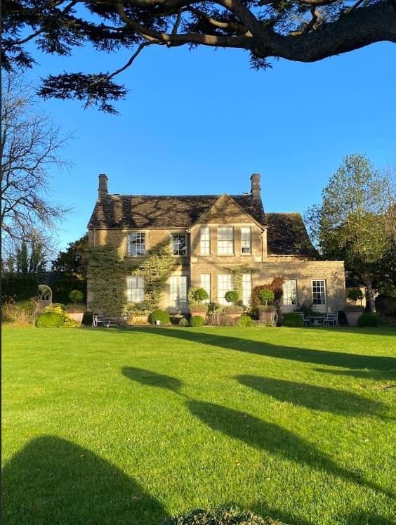 Lush green garden of a hotel on a sunny day