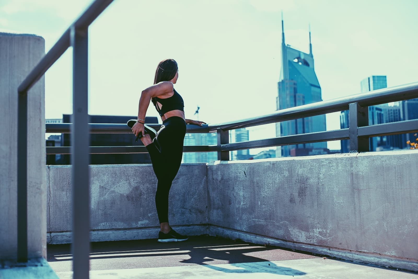 Travel advisor Sarah doing yoga on a rooftop