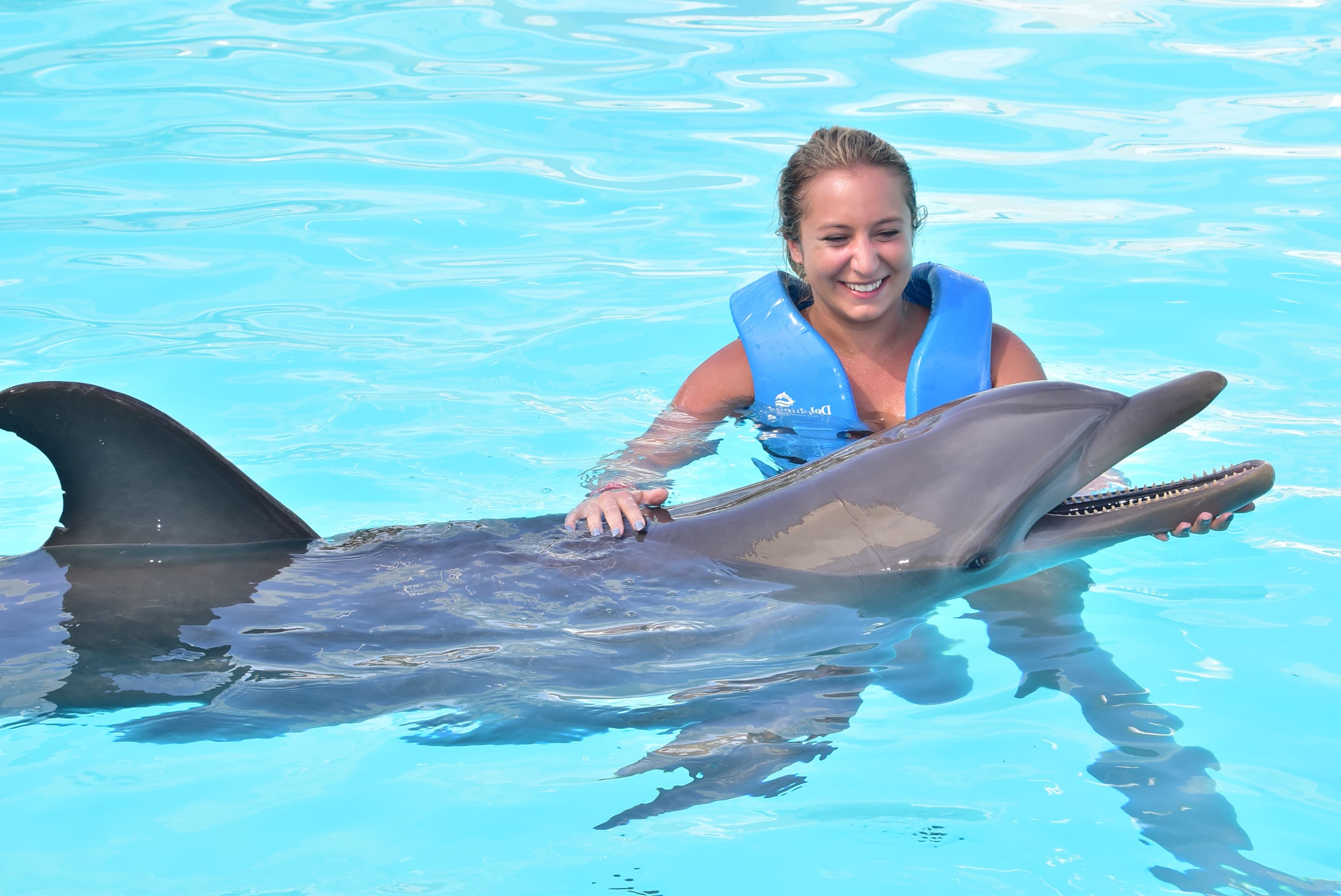 Picture of Brittany with dolphin