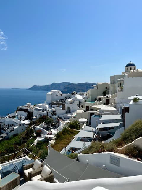View of Santorini caldera with classic white buildings and ocean