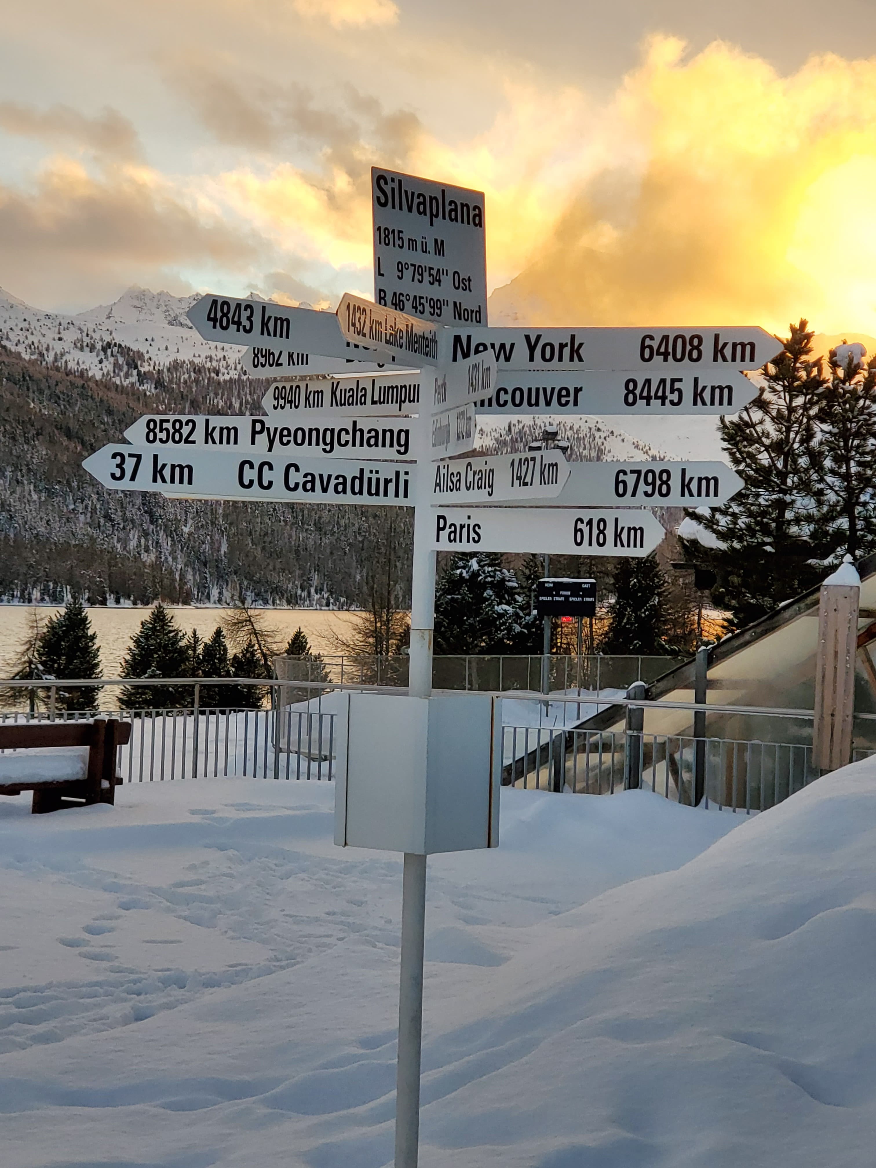 Travel destination sign in the snow
