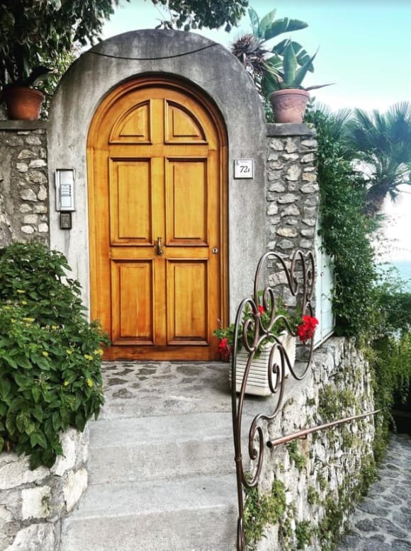 Old red and white shopfront in Positano