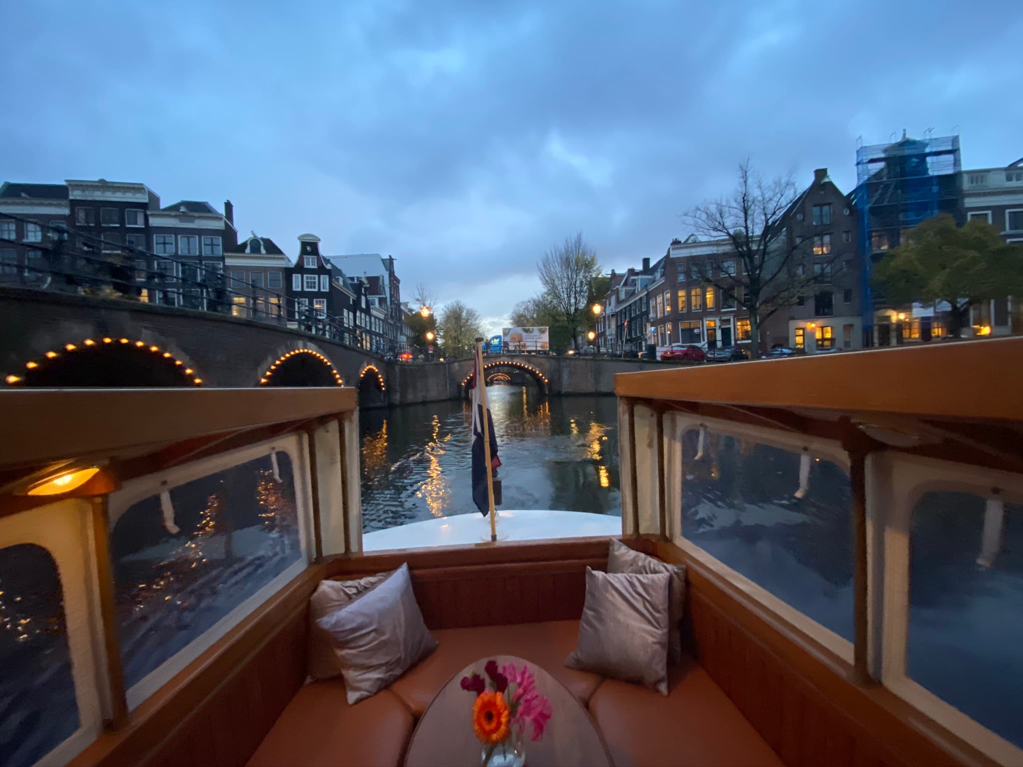 View from a boat ride in a canal in the evening
