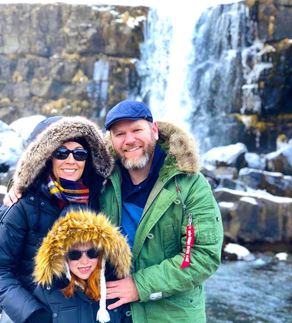 Picture of Chanin with family near waterfall