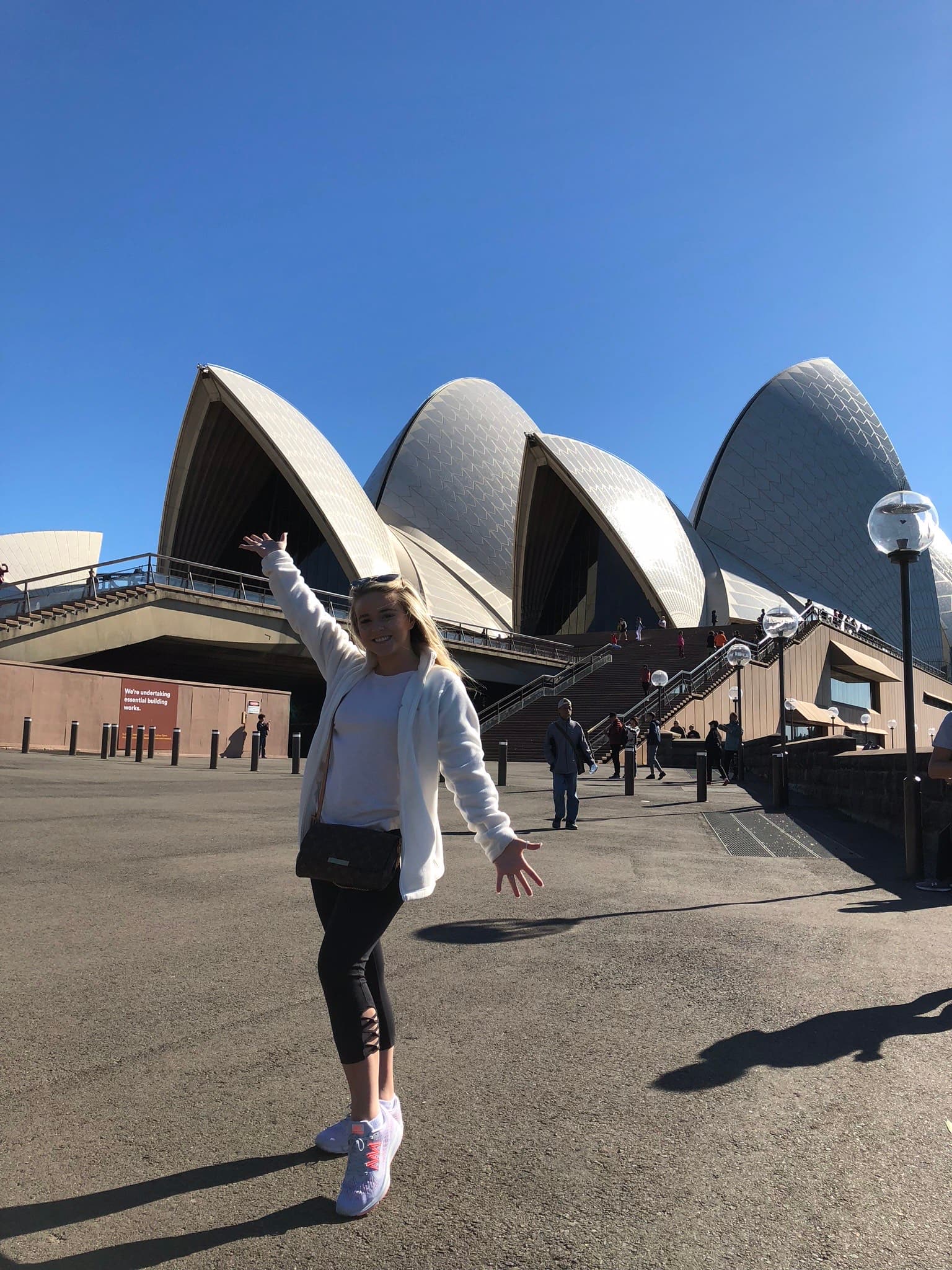 Posing for a picture at Sydney Opera House