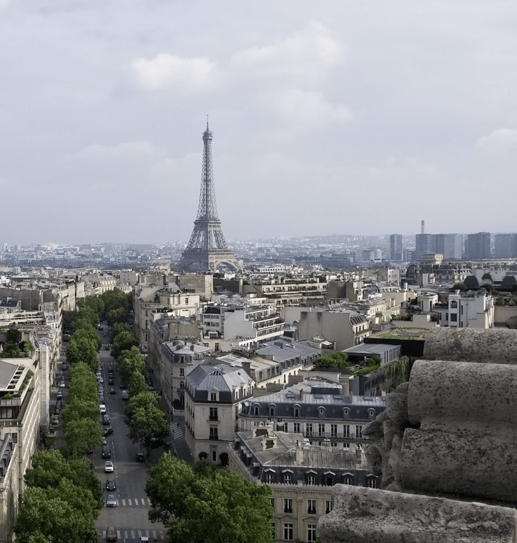 A view of the Eiffel Tower and city streets in Paris.