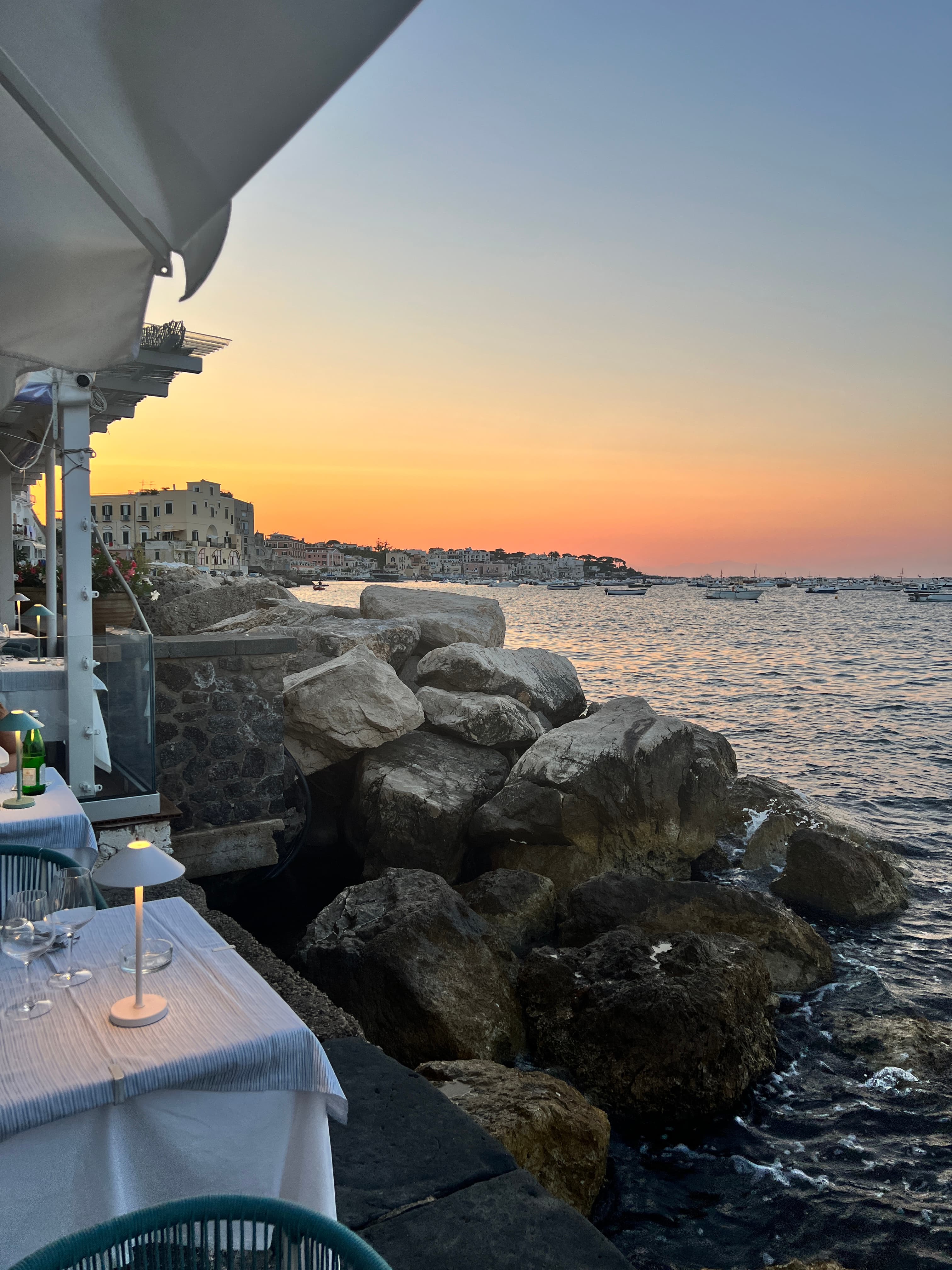 Beautiful dining setup of a restaurant by the sea