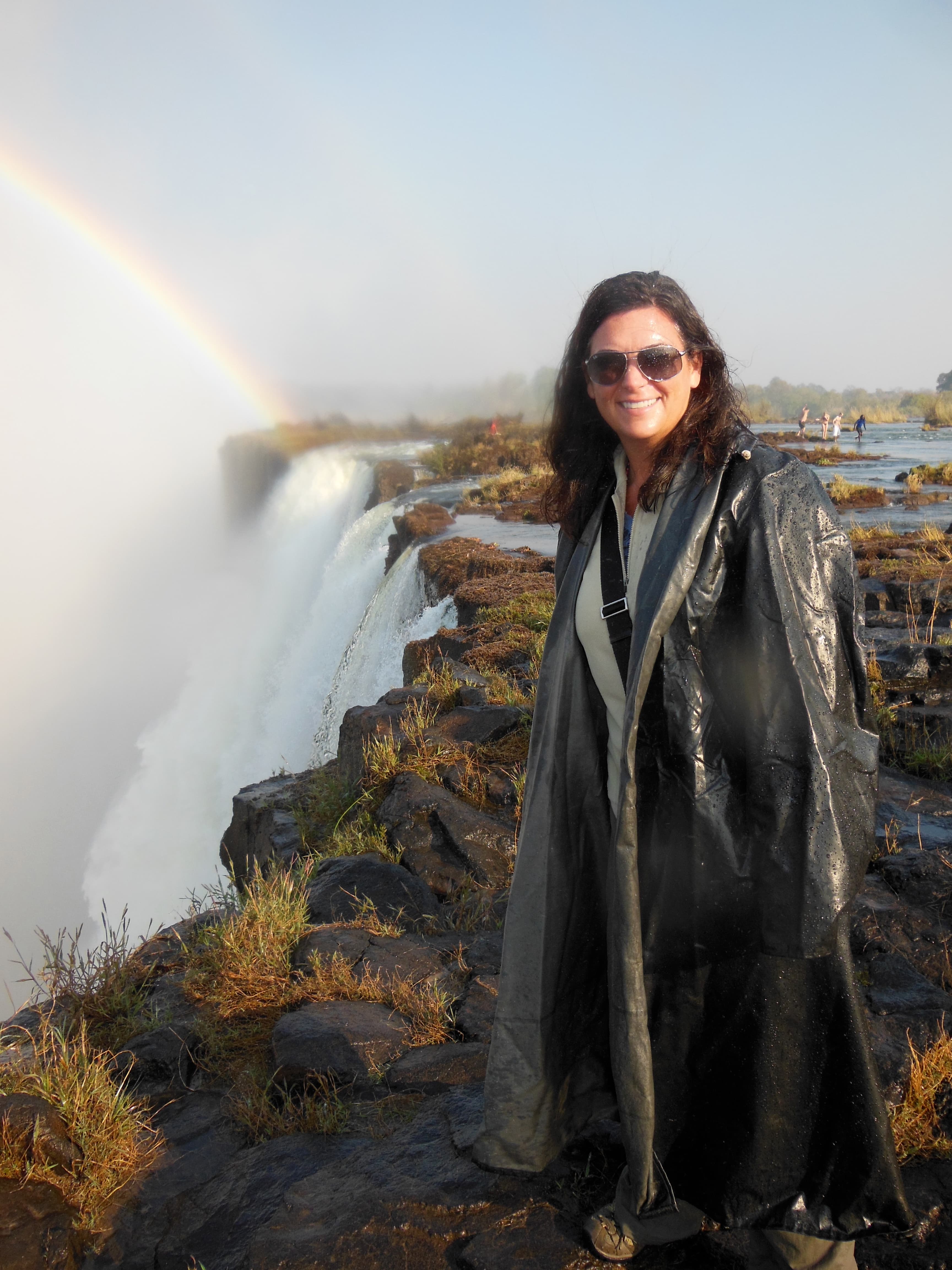 View of rainbow by the waterfall