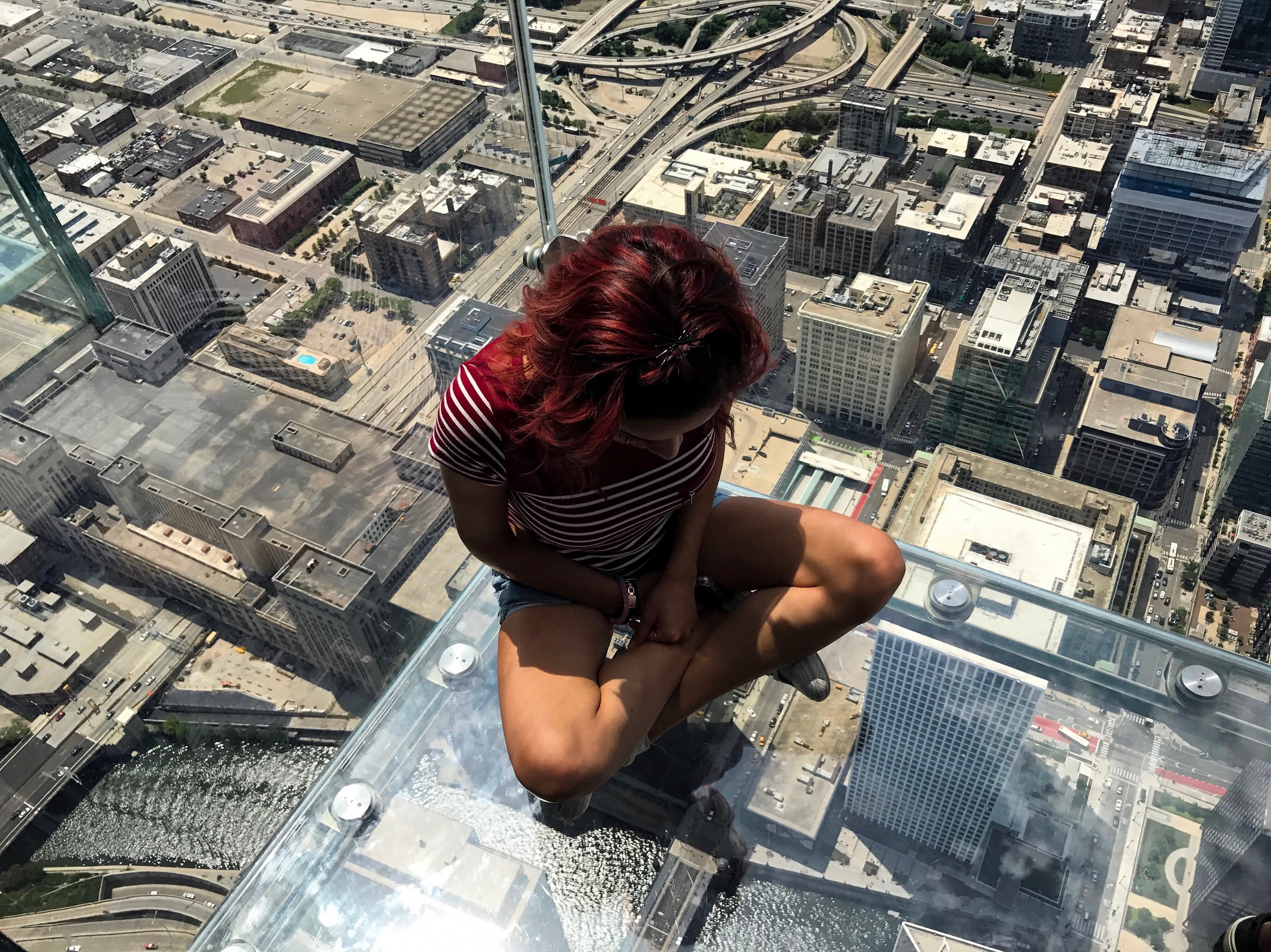 Picture of Kayla sitting on Skydeck Chicago