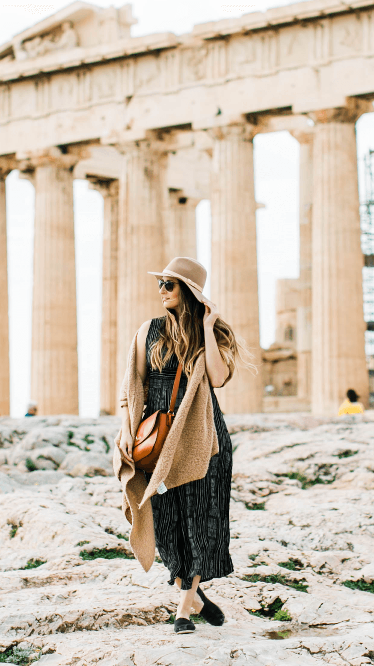 Posing for a photo in front of Acropolis of Athens
