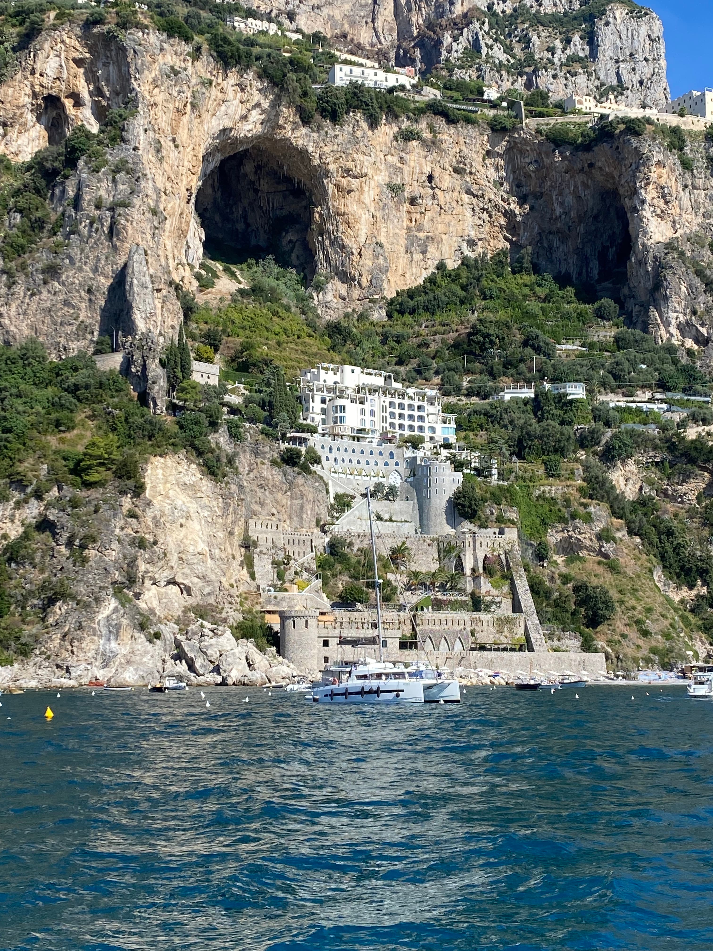 Borgo Santandrea – view from the water of a hotel on a cliffside