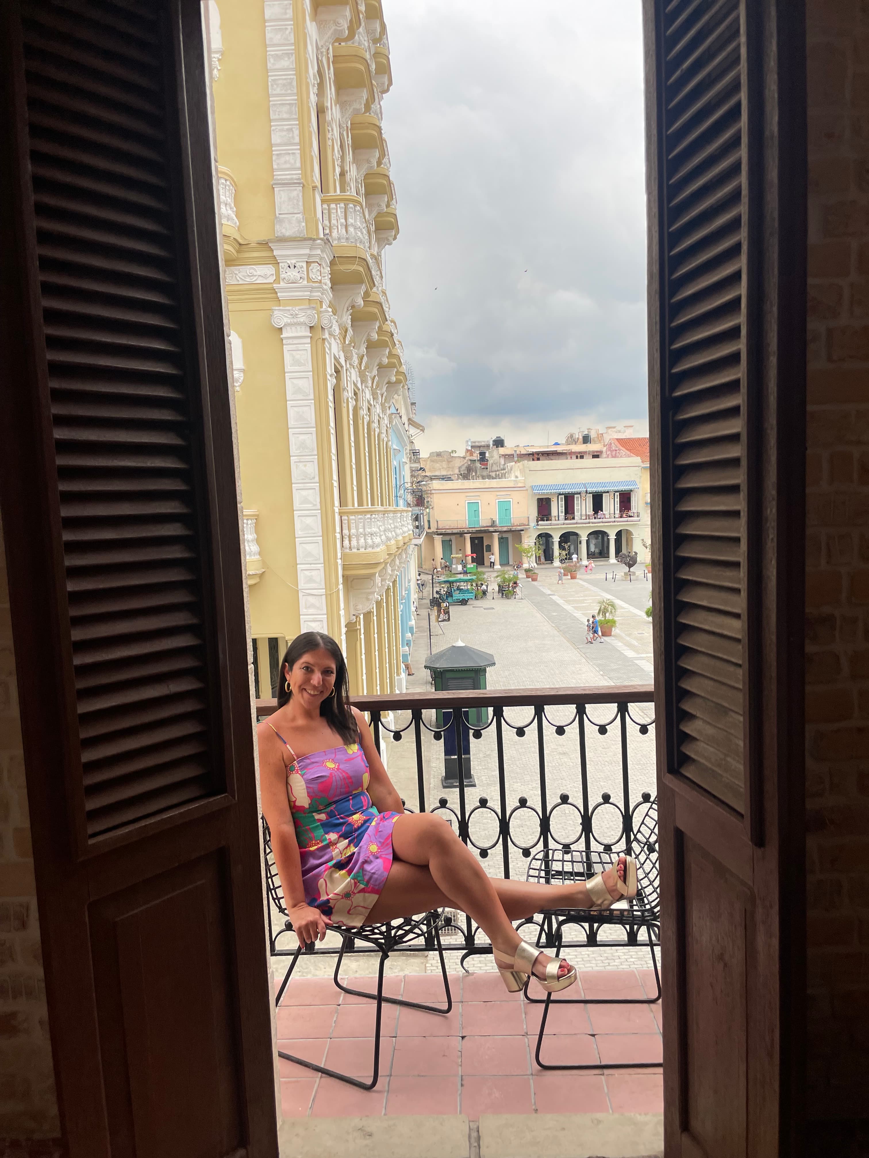 Sitting on a chair on the balcony