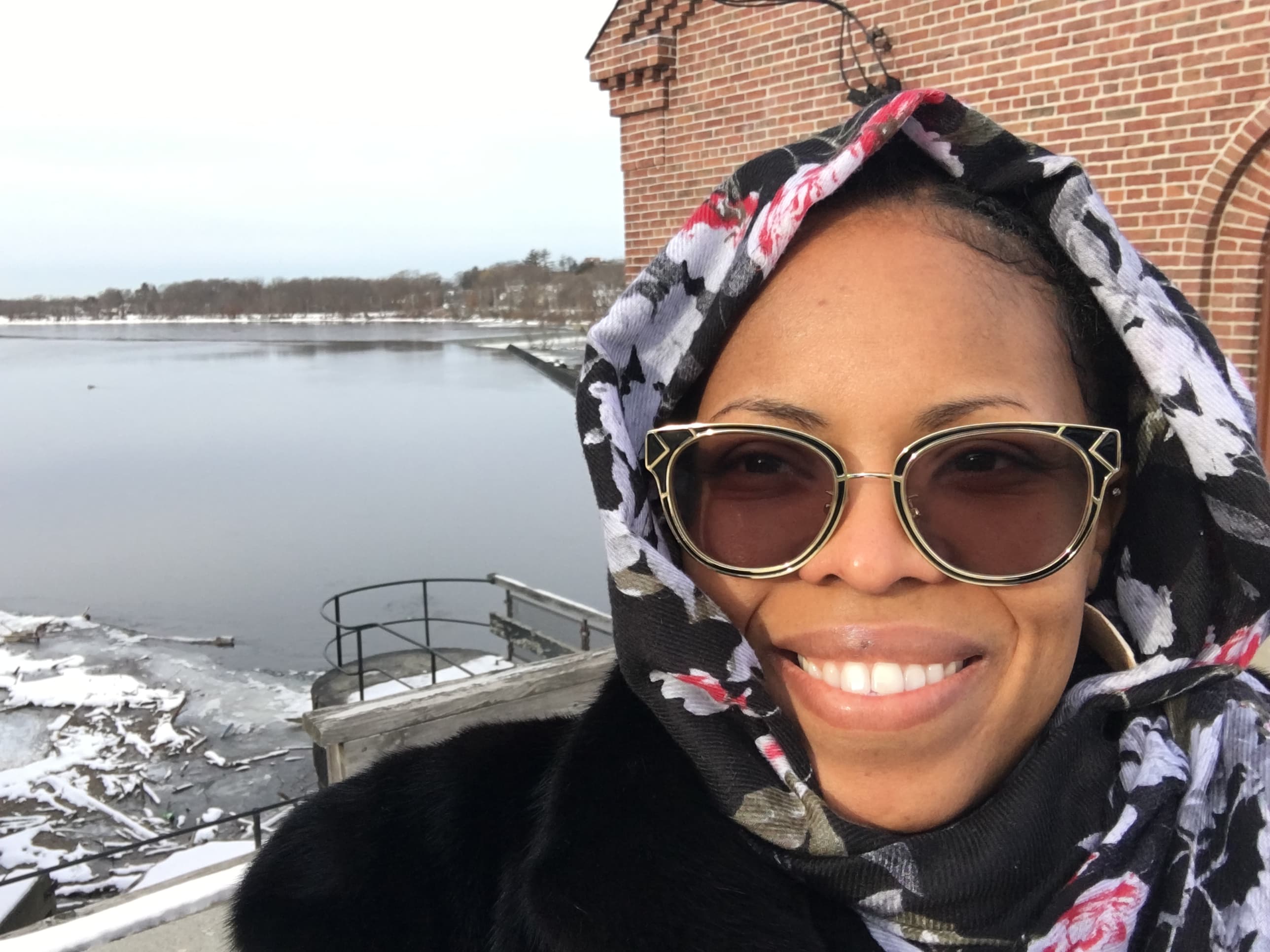 Shayna Scott wearing sunglasses and scarf