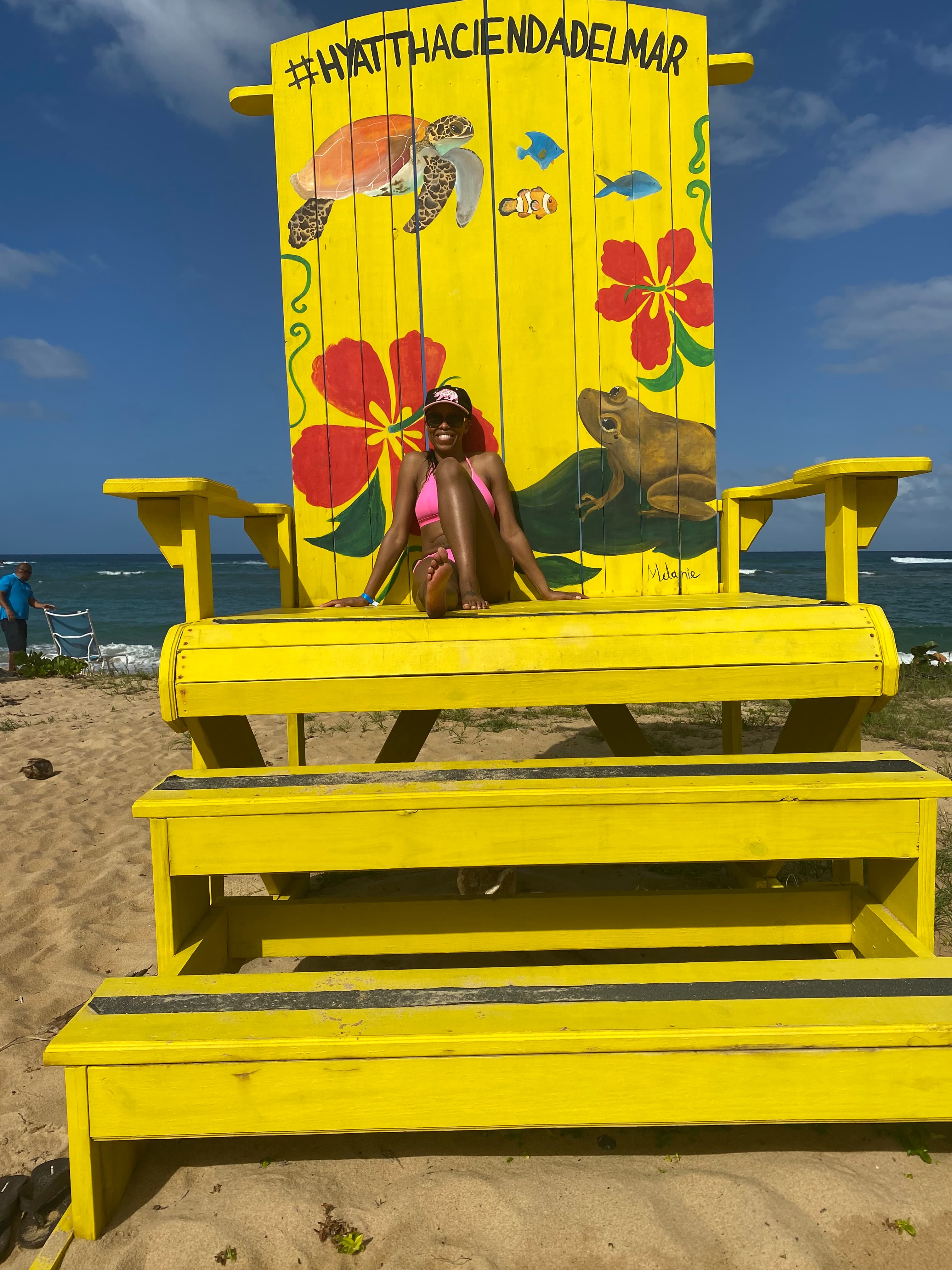 Sitting on a big yellow chair