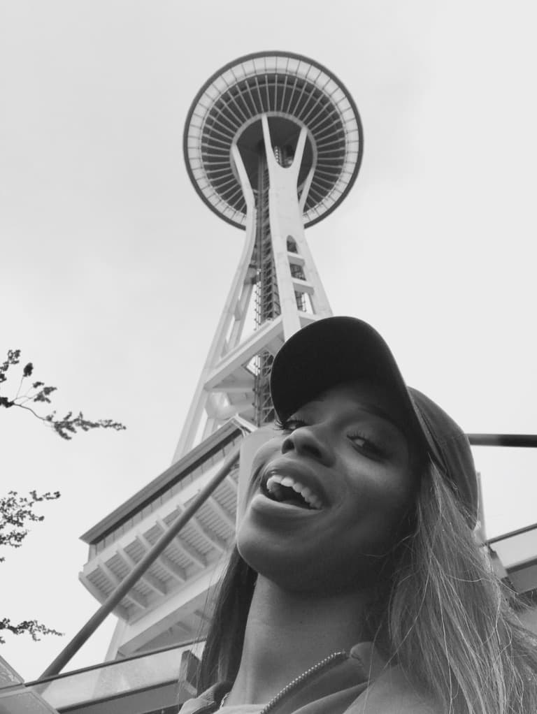 Posing for a picture with Space Needle in view