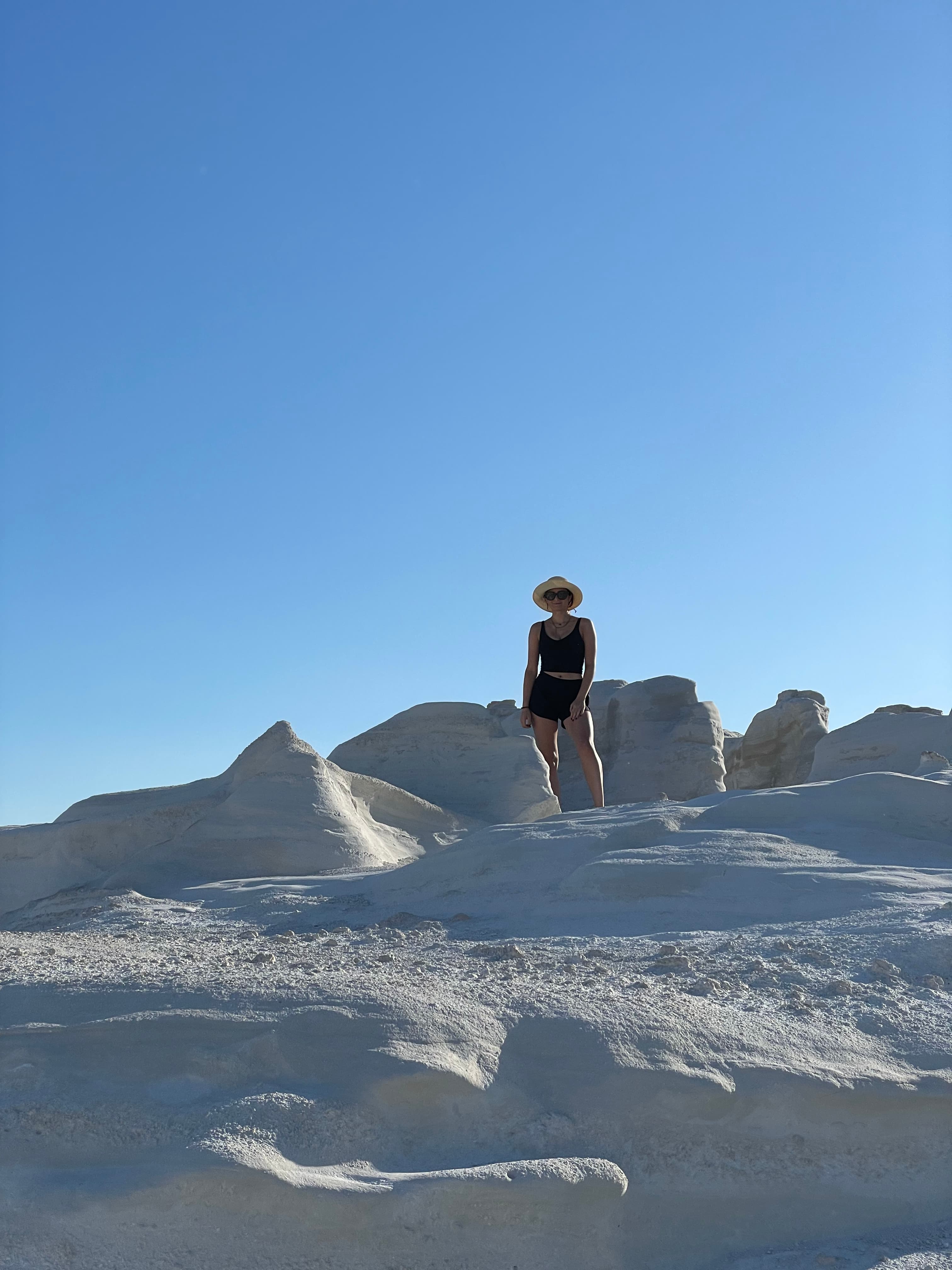 Posing for a picture at The Moon Beach Sarakiniko