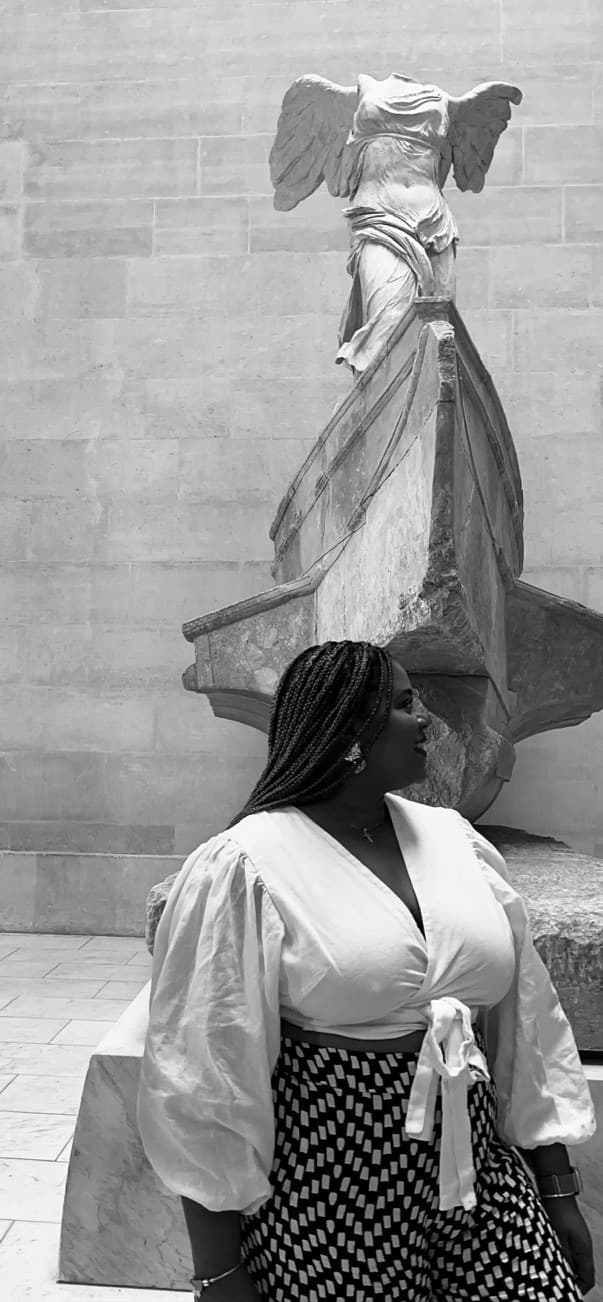 Picture of Asha with Winged Victory of Samothrace artwork