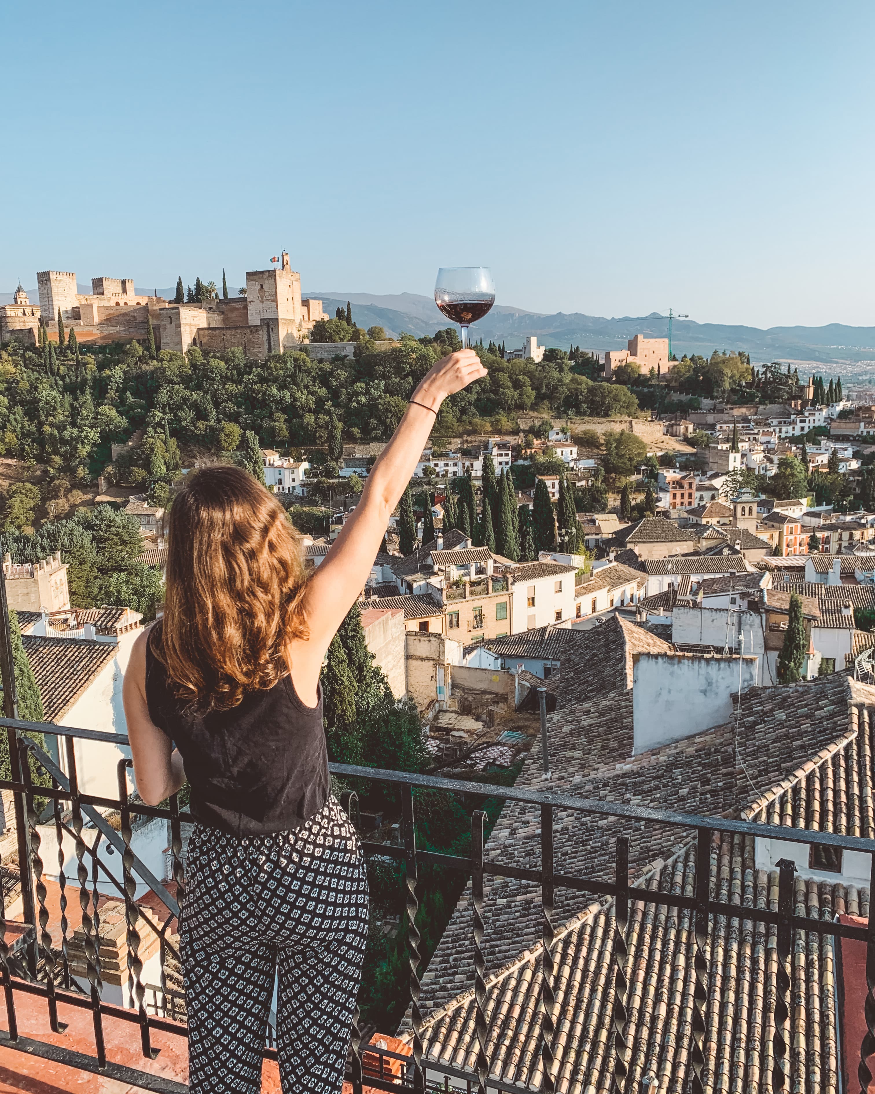 Picture of Sarah with wine glass in hand