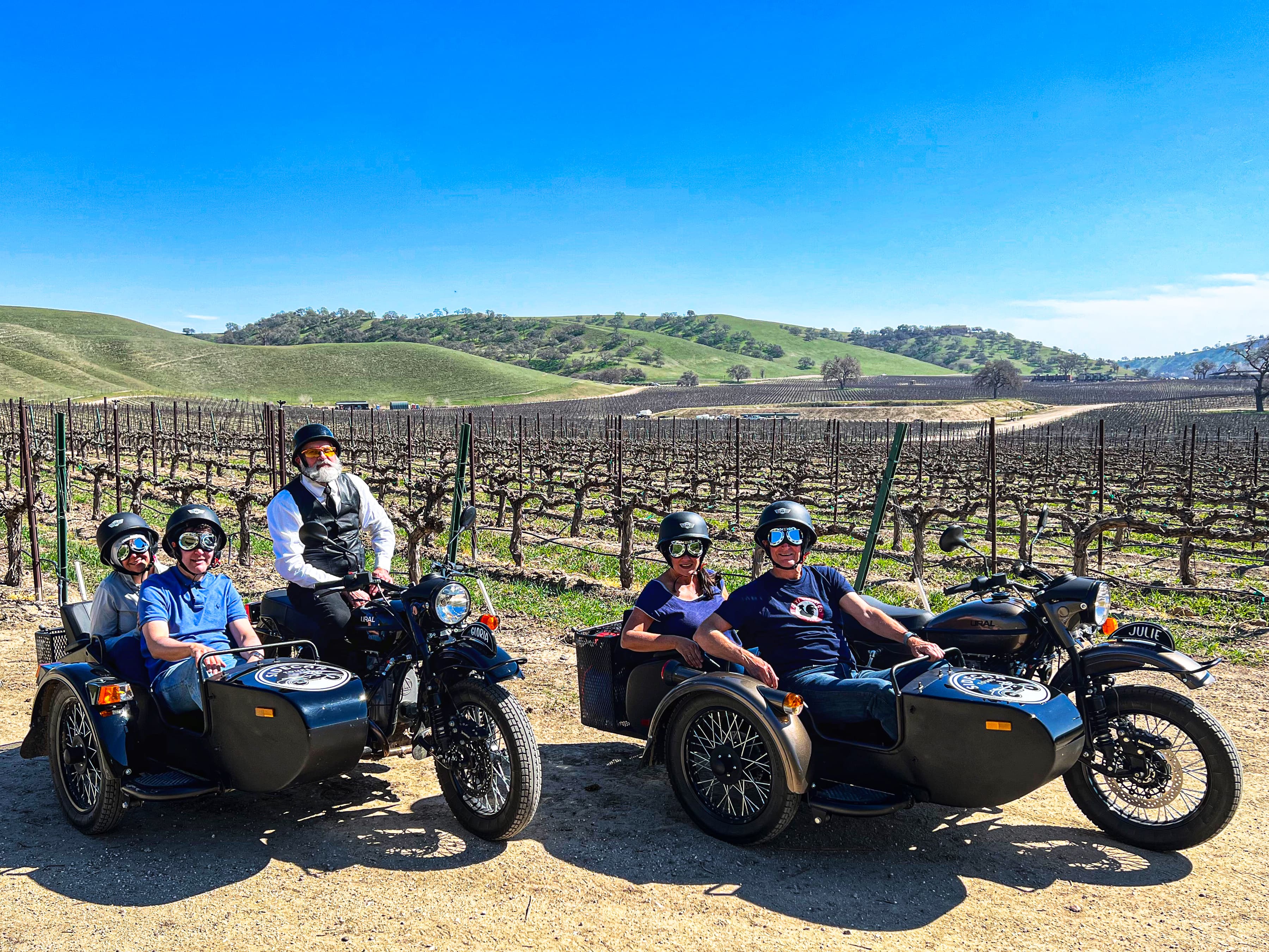 Picture of Jen visiting vineyard on bike