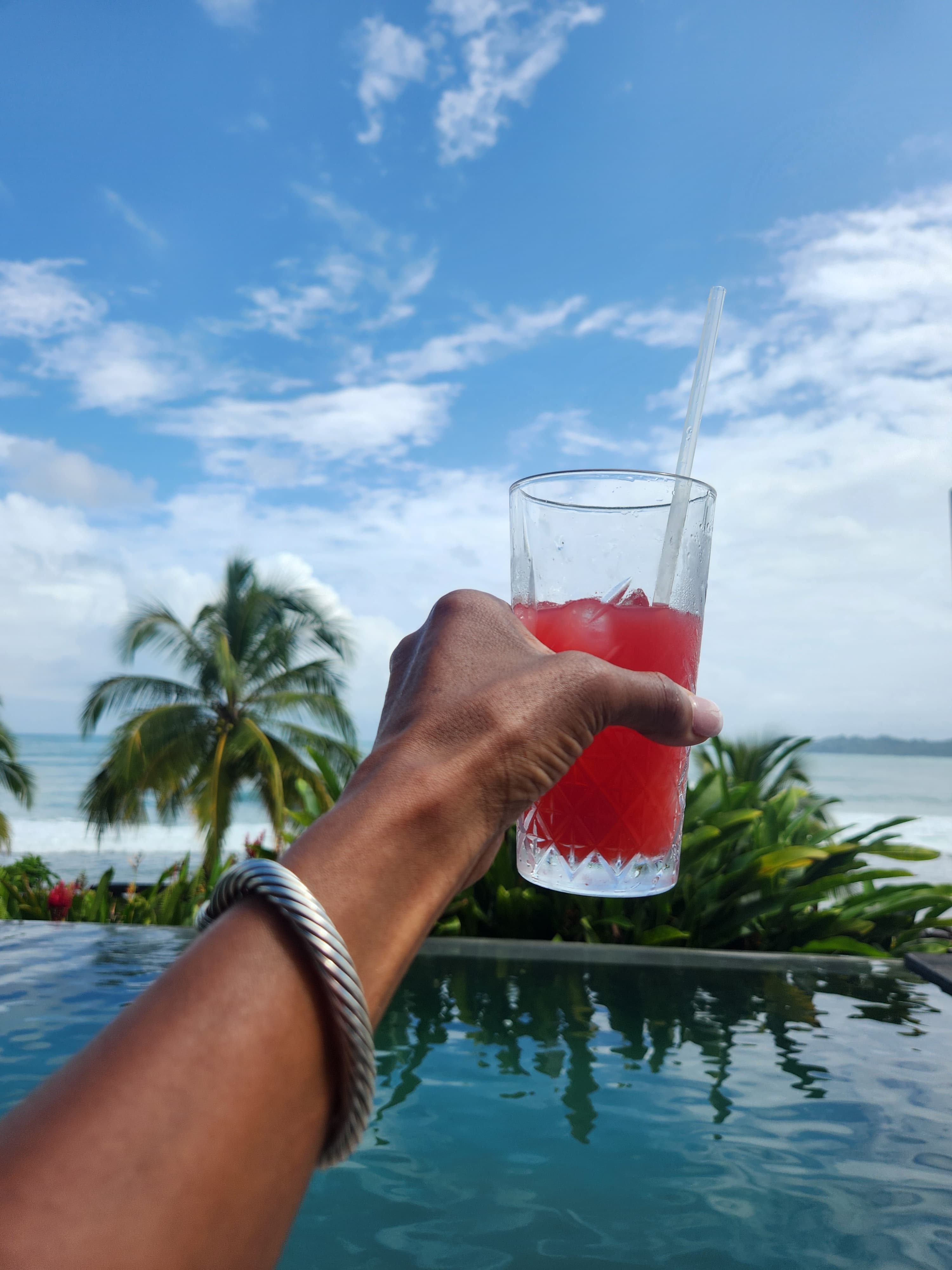 Picture of a juice glass in hand