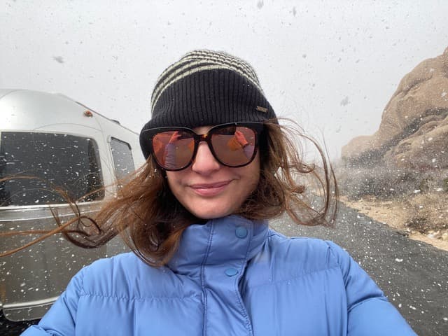 Posing for a picture in snow fall