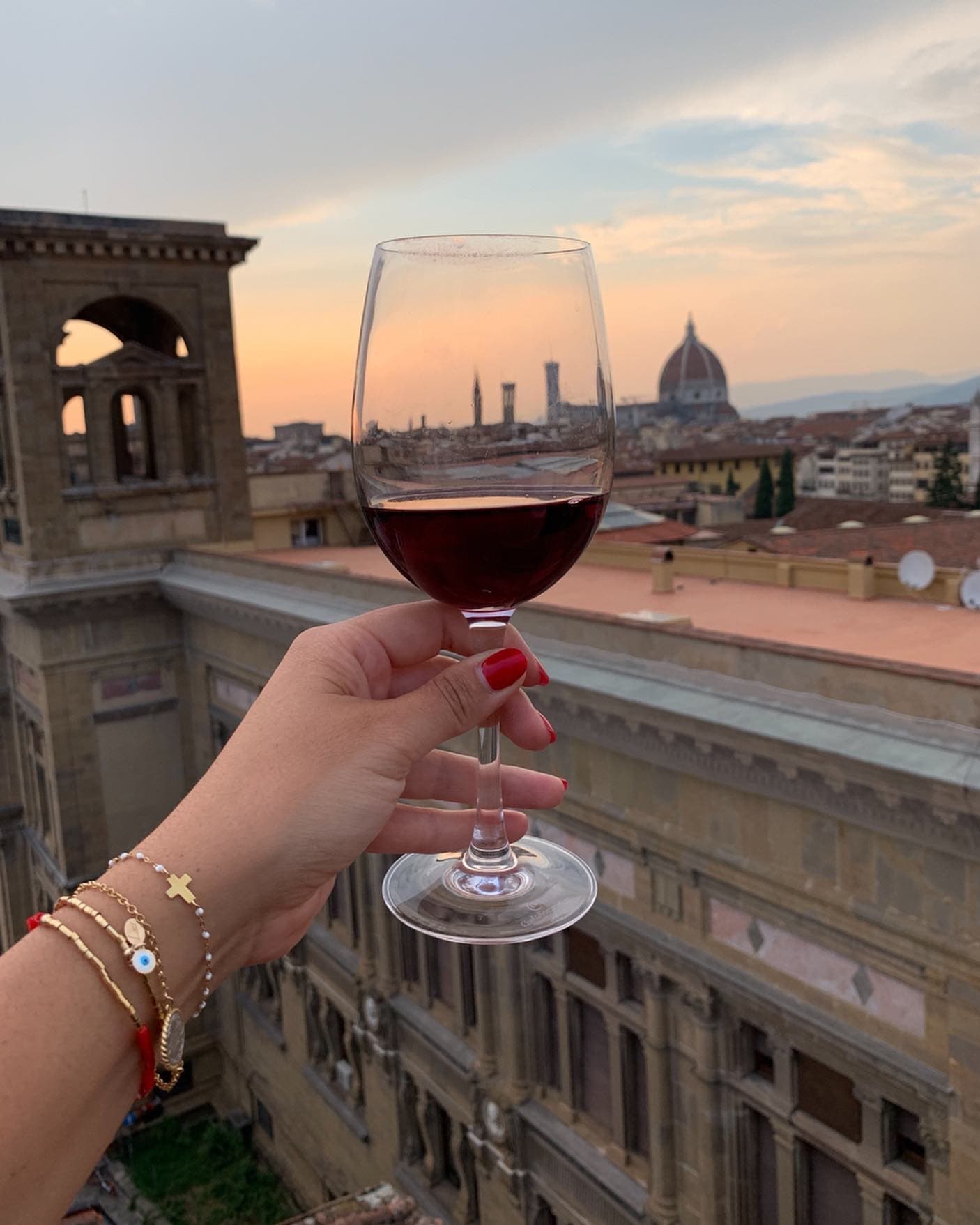 Raising a glass to the scenic views of Florence, Italy
