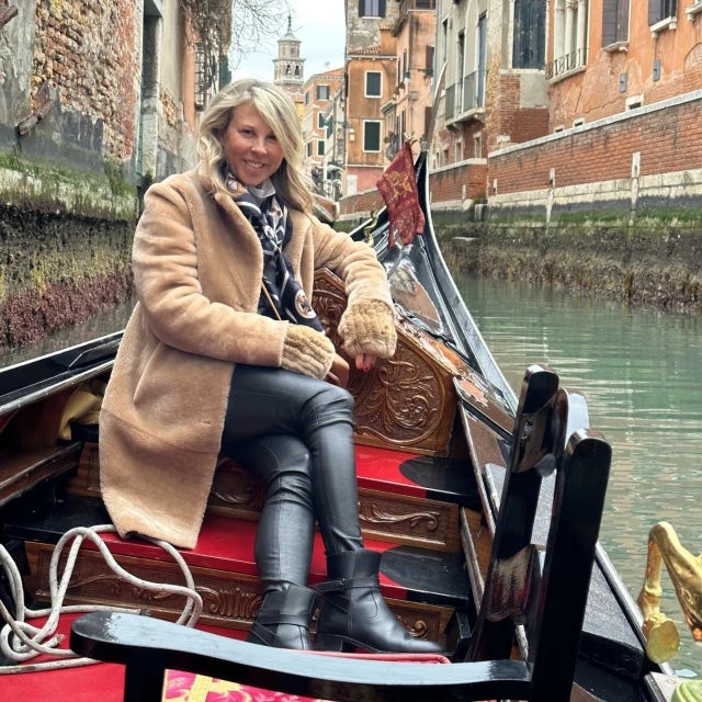 Travel advisor Kelli Walden riding on a Venetian gondola.