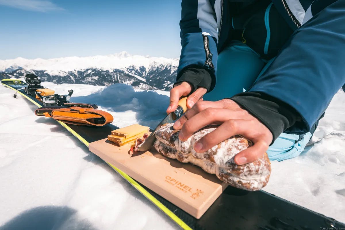Making cheese and charcuterie plates on the snowy mountain top