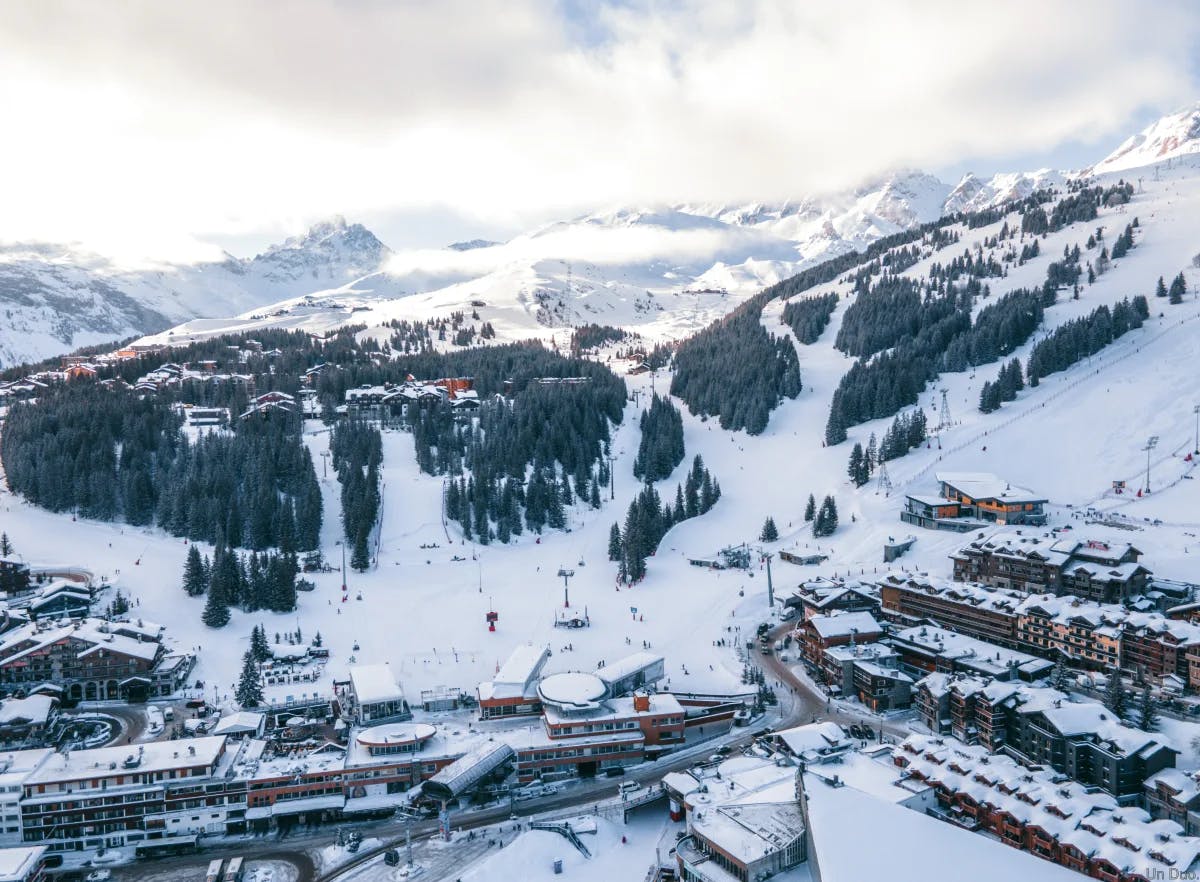A view of Courchevel covered in snow during the day time
