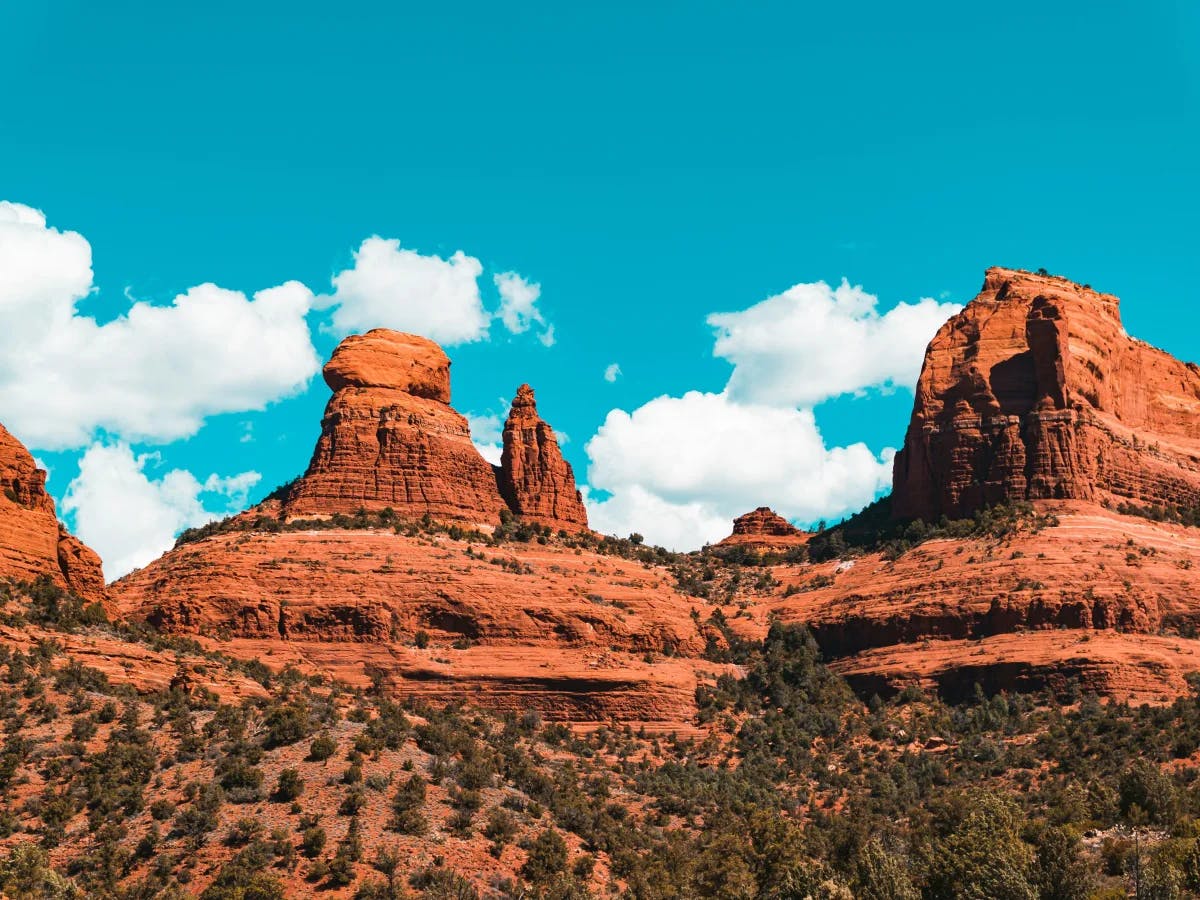 A picture of red rock formation during the daytime.
