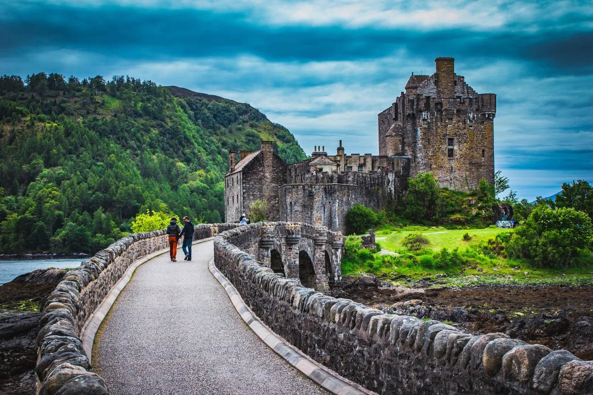 Crossing the bridge to Eilean Donan Castle which is located on Kyle Of Lochalsh which overlooks the Isle of Skye.