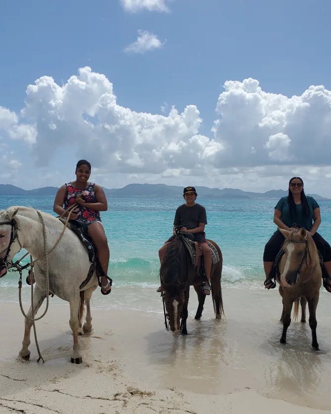 horse riding at beach