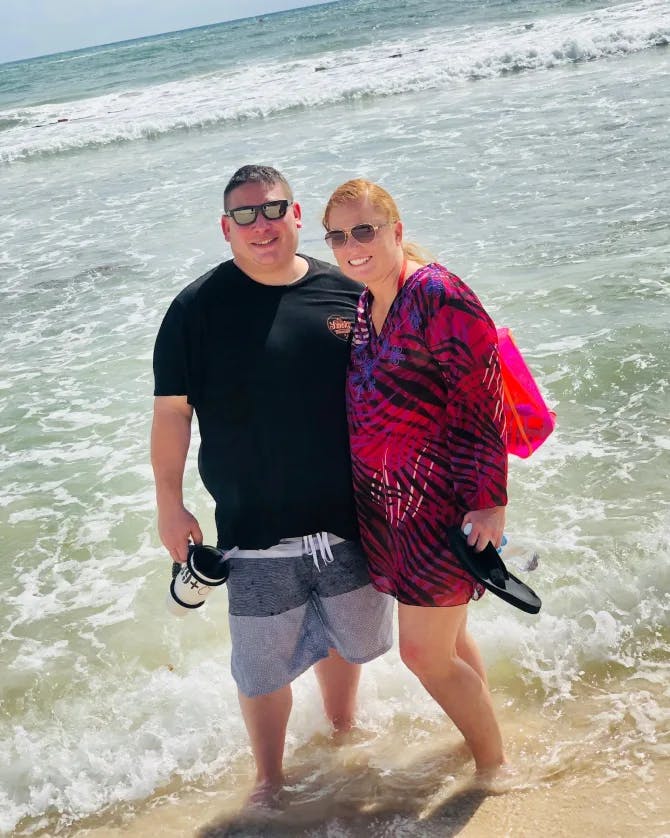 Posing for a couple photo on the beach