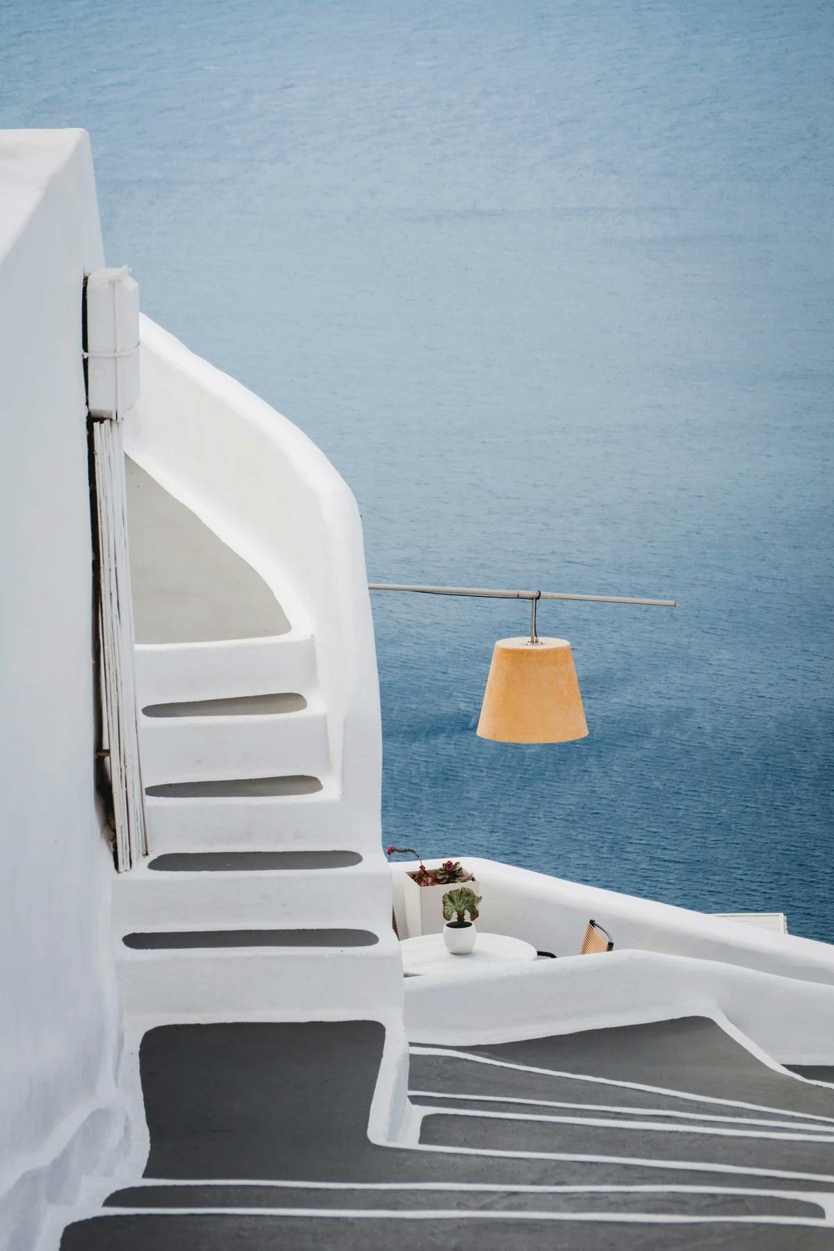 White building in Santorini, Greece with ocean
