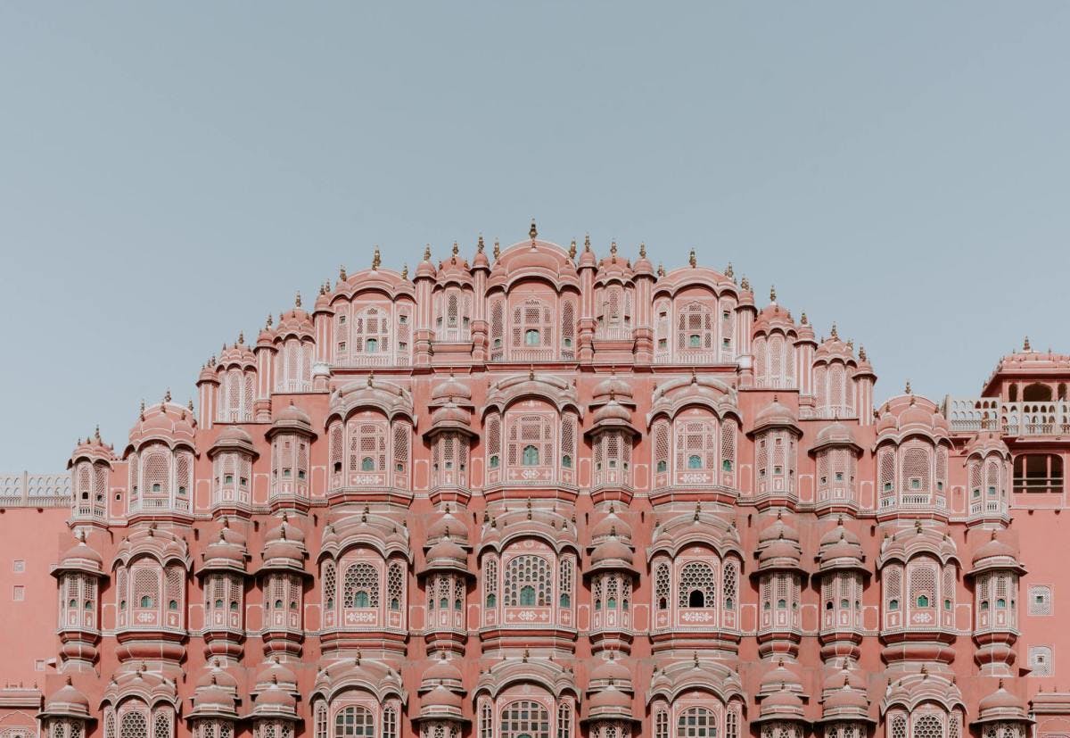 Iconic pink building in Jaipur, India on a clear day. 