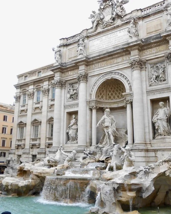 Picture of the Trevi Fountain on a cloudy day.