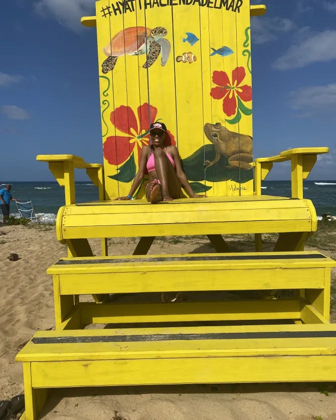Sitting on a big yellow chair