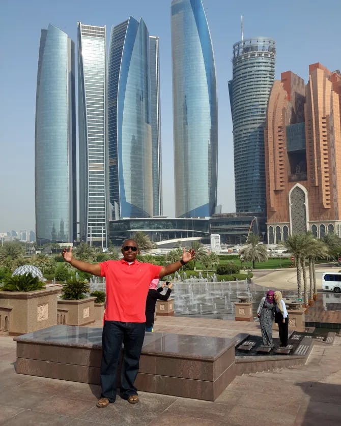 Picture of Harold standing in front of skyscrapers in Dubai