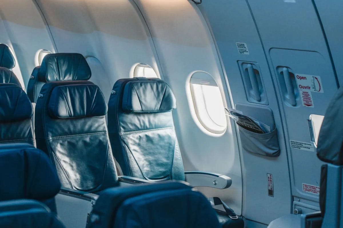 How long does it take to become a travel agent? As fast as an airliner. Pictured here: empty business-class seats on an airliner with the window shades open
