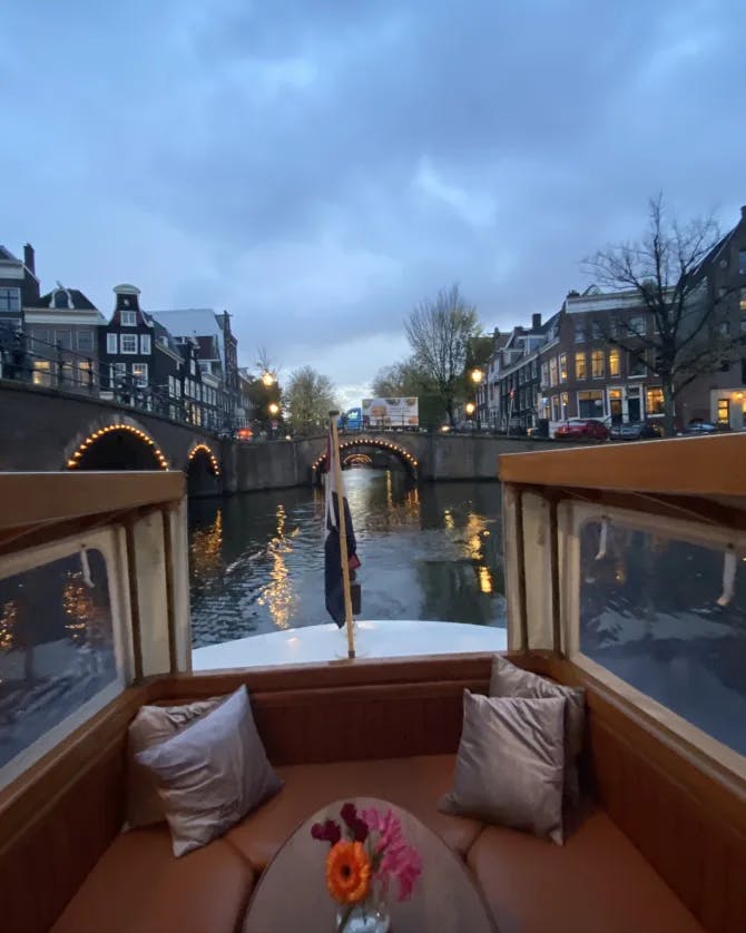 View from a boat ride in a canal in the evening