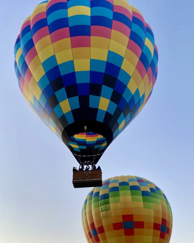 A colorful hot air balloon in motion