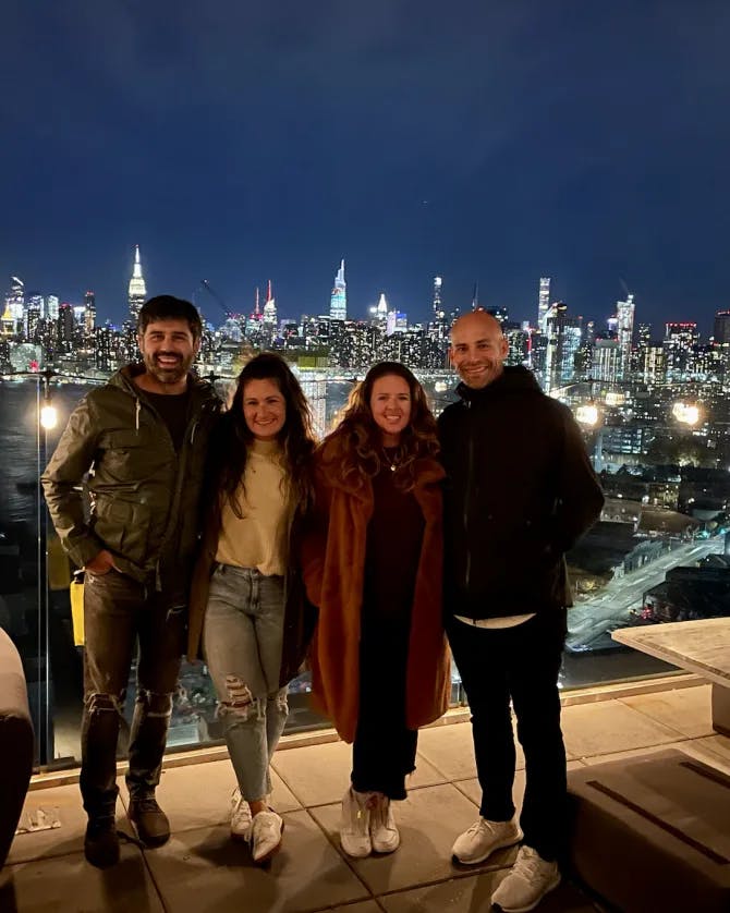 Group photo with night city view