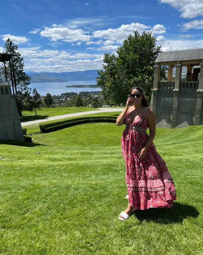 Travel advisor Giovanna Saulle posing for a photo in a beautiful garden