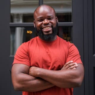 Fora's Senior Frontend Engineer Victor Okon smiling at the camera