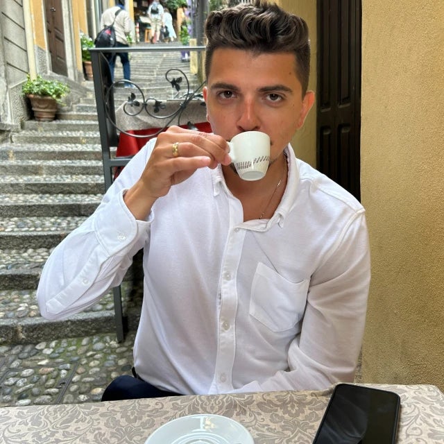 Picture of Nicholas with cup of tea