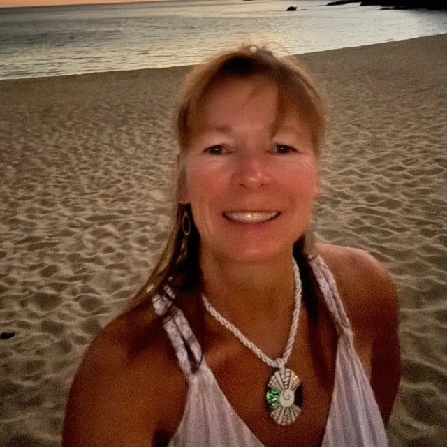 Travel advisor Ruth on a beach