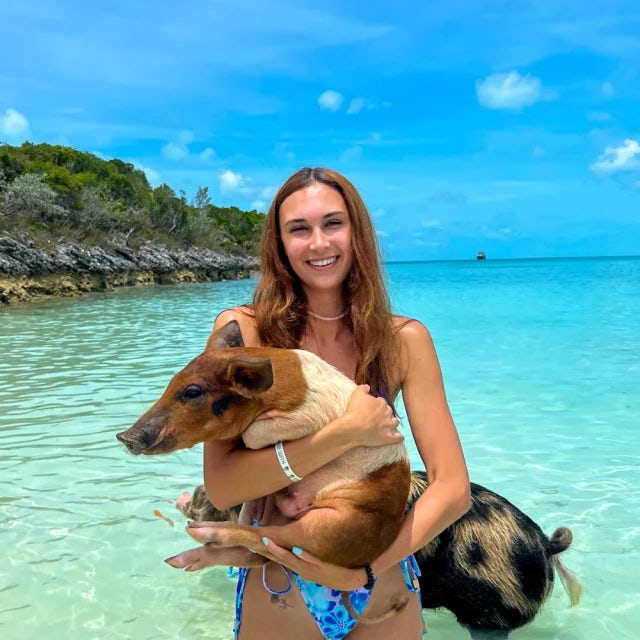 Travel Advisor Kaylee Morgan smiling while on a tropical getaway. 